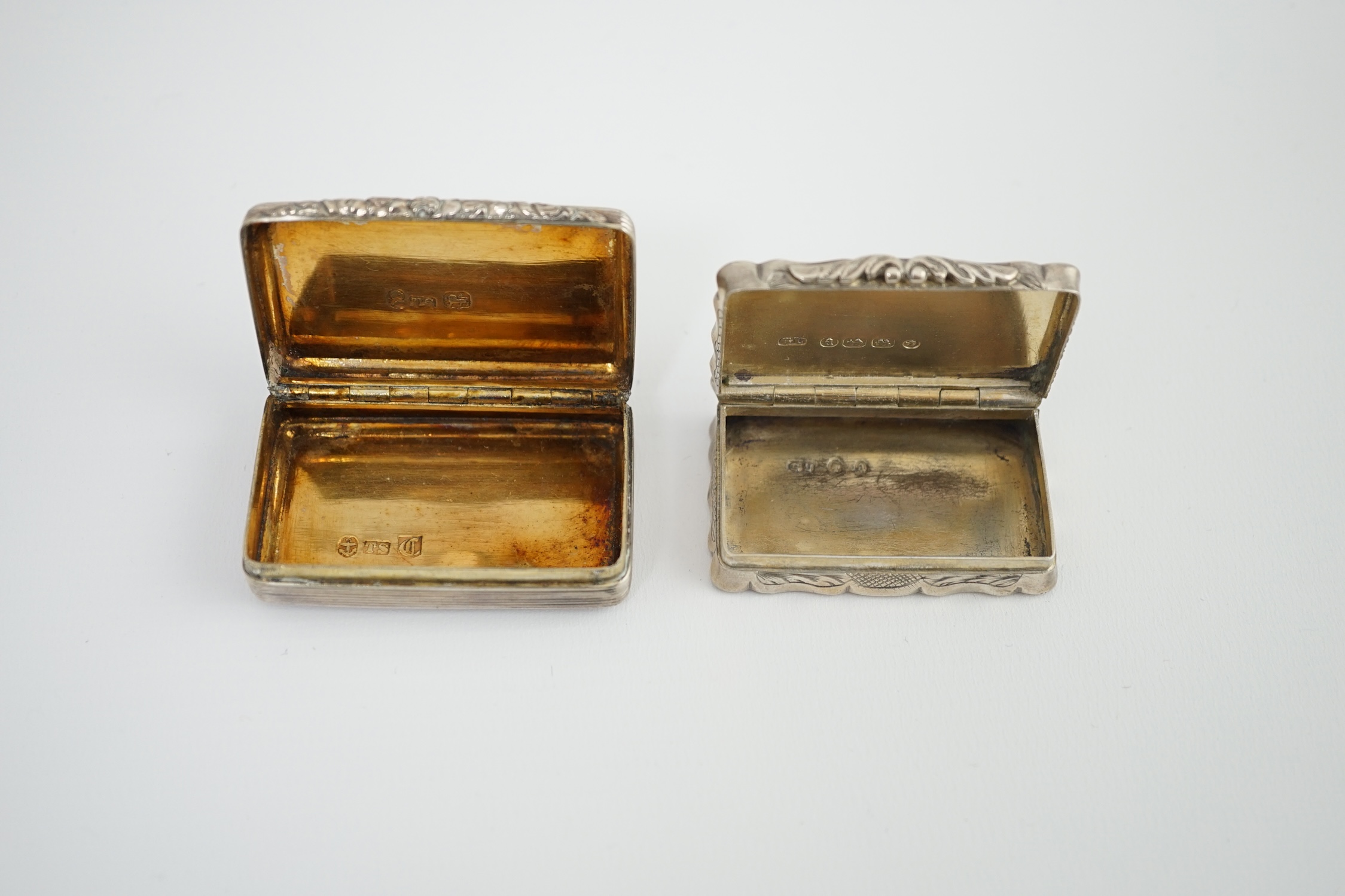 A George IV silver snuff box, with engraved initials, Thomas Shaw?, Birmingham, 1826, 54mm, together with a Victorian silver snuff box, George Unite, Birmingham, 1875.